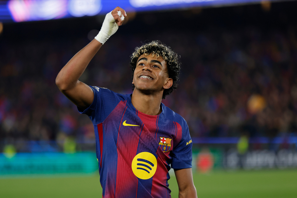 Barcelona's Lamine Yamal celebrates after scoring a penalty, his side's third goal during the Champions League round of 16, second leg soccer match between FC Barcelona and Newcastle United FC in Barcelona, Spain, Wednesday, March 18, 2026. (AP Photo/Joan Monfort)
