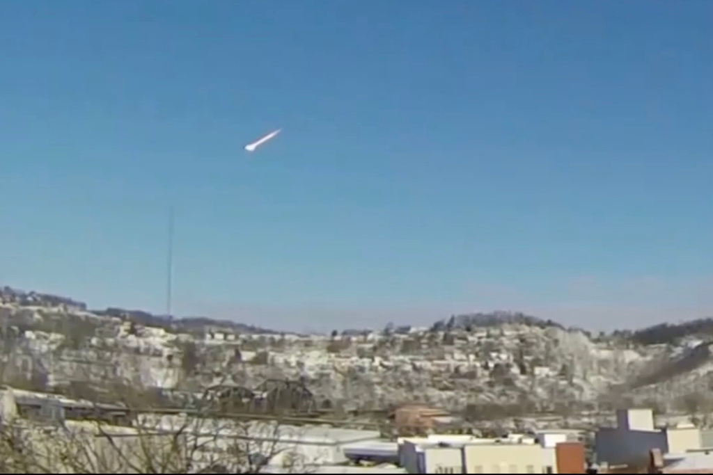This image taken from video shows a suspected meteor falling through the sky in the greater Pittsburgh, Pa., area on Tuesday, March 17, 2026. (Jared Rackley via AP)