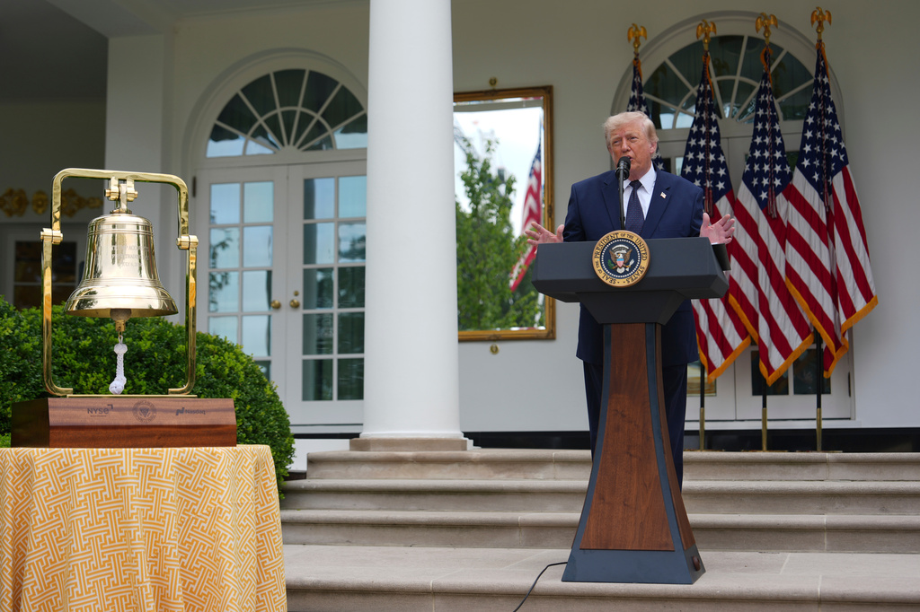 President Donald Trump speaks alongside the New York Stock Exchange bell at a lunch in the White House Rose Garden, Monday, July 6, 2026, in Washington. (AP Photo/Julia Demaree Nikhinson)
