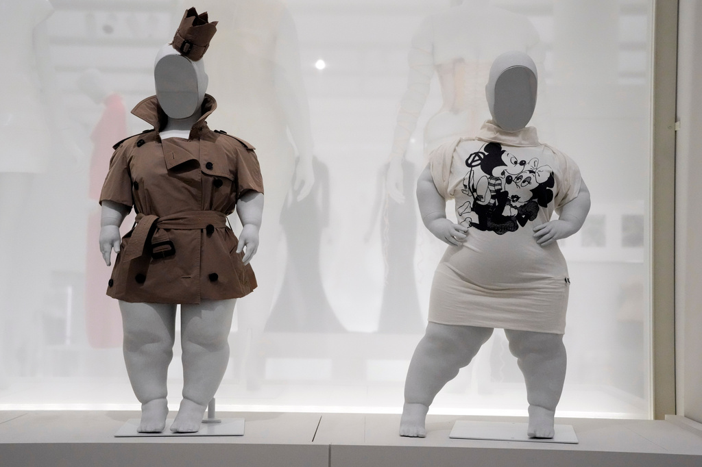 Designs by Burberry, left, and Vivienne Westwood are displayed on Sinéad Burke mannequins in the "Disabled Body" section of the Metropolitan Museum of Art's Costume Institute exhibition, "Costume Art," on Saturday, May 2, 2026, in New York. (Photo by Charles Sykes/Invision/AP)