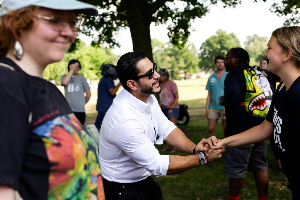 Michigan U.S. Senate candidate, Abdul El-Sayed, is seen greeting volunteers at a canvassing event at Riverside Park on Tuesday, July 7, 2026 in Grand Rapids, MI. (AP Photo/Kristen Norman)
