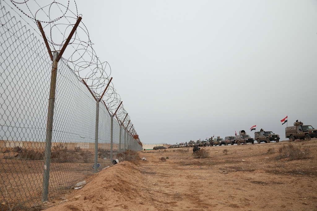 PKK-linked Yazidi militia units to disarm and join Iraq's army in push ...