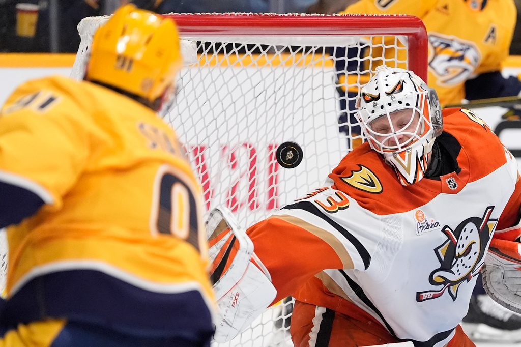 Anaheim Ducks goaltender Ville Husso (33) lets a goal by Nashville Predators center Steven Stamkos (91) score during the second period of an NHL hockey game Thursday, April 16, 2026, in Nashville, Tenn. (AP Photo/George Walker IV)