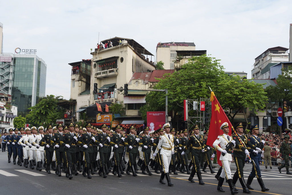 People's Liberation Army of China march during military parade rehearsal for the Vietnam's 80th National Day celebration in old town of Hanoi, Vietnam, Saturday, Aug. 30, 2025. (AP Photo/Vincent Thian)