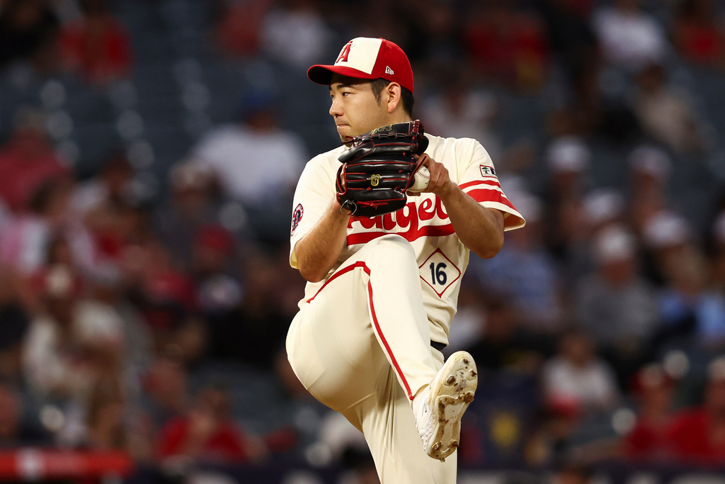 Los Angeles Angels pitcher Yusei Kikuchi prepares to throw to a Kansas City Royals batter during the second inning of a baseball game, Wednesday, Sept. 24, 2025, in Anaheim, Calif. (AP Photo/Jessie Alcheh)