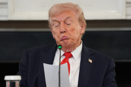 President Donald Trump reads a note handed to him by Secretary of State Marco Rubio during a roundtable meeting on antifa in the State Dining Room at the White House, Wednesday, Oct. 8, 2025, in Washington. (AP Photo/Evan Vucci) President Donald Trump reads a note handed to him by Secretary of State Marco Rubio during a roundtable meeting on antifa in the State Dining Room at the White House, Wednesday, Oct. 8, 2025, in Washington. (AP Photo/Evan Vucci)