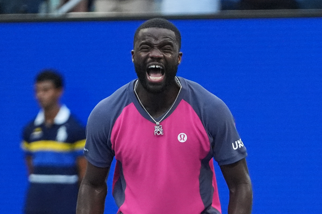 Frances Tiafoe, of the United States, celebrates winning a match against Daniil Medvedev, of Russia, during the fourth round of the U.S. Open tennis championships, Sunday, Sept. 6, 2026, in New York. (AP Photo/Frank Franklin II)