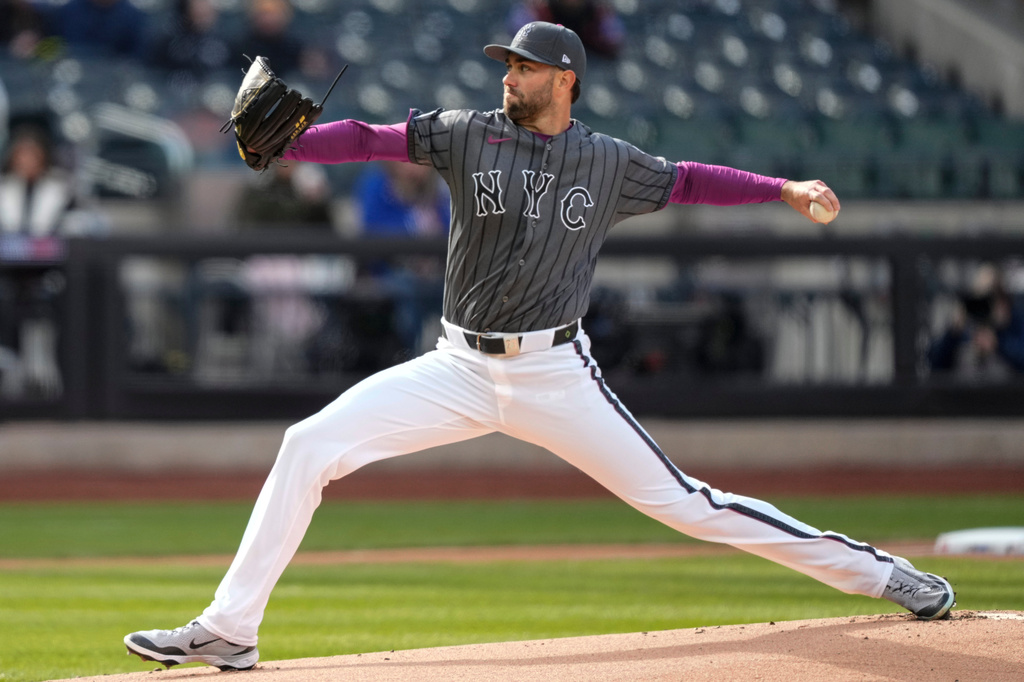New York Mets' pitcher David Peterson (23) throws during the first inning of a baseball game against the Pittsburgh Pirates, Saturday, March 28, 2026, in New York. (AP Photo/Yuki Iwamura)