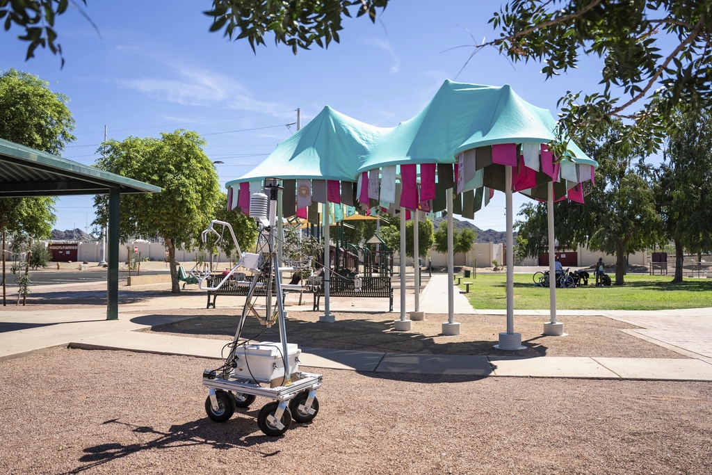 MaRTY, an instrument that is used to take measurements in direct sun and shade sits near the Reflections on Sunnyslope shade structure, Saturday, Aug. 30, 2025, at Sunnyslope Park in Phoenix. (AP Photo/Samantha Chow)