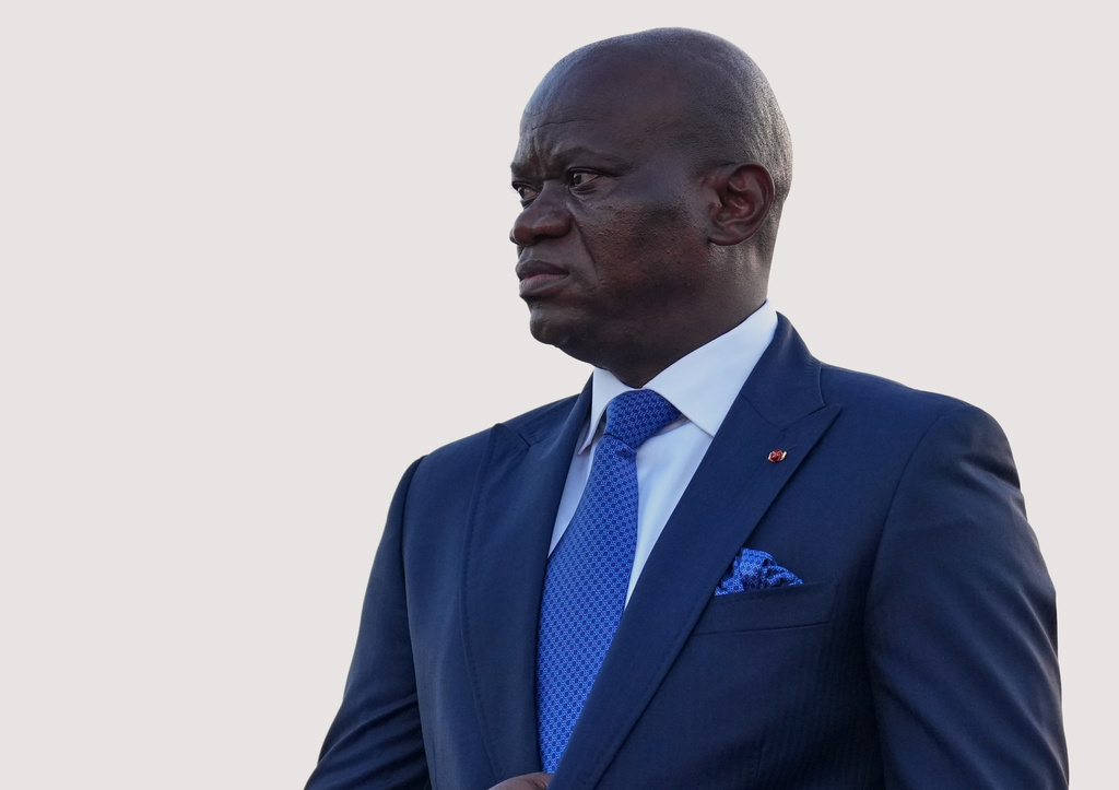 FILE - Gabon's President Brice Oligui Nguema waits to welcome France's President Emmanuel Macron at the Leon-Mba International Airport in Libreville, Gabon, Sunday, Nov. 23, 2025. (AP Photo/Thibault Camus, file)