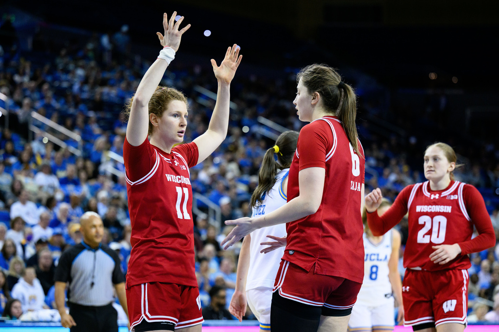 Wisconsin guard Jovana Spasovski (11) reacts during the first half of an NCAA college basketball game against UCLA, Sunday, Feb. 22, 2026, in Los Angeles. (AP Photo/William Liang)
