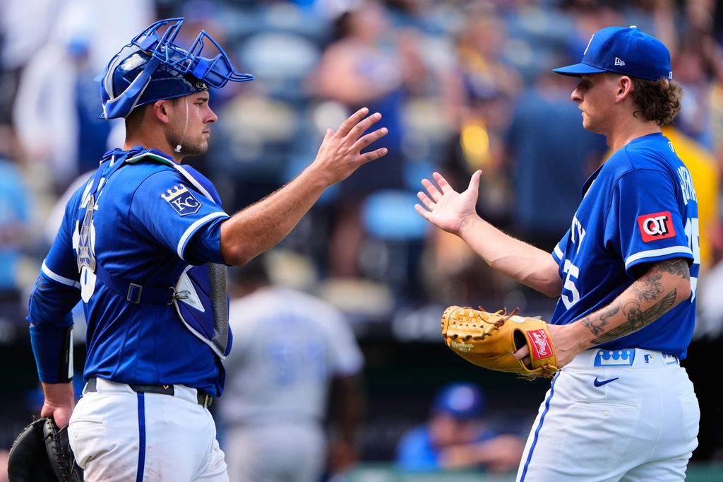 Kansas City Royals' Nolan Hoffman, right, and Luke Maile celebrate after their baseball game against the Kansas City Royals, Sunday, Sept. 6, 2026, in Kansas City, Mo. (AP Photo/Charlie Riedel)