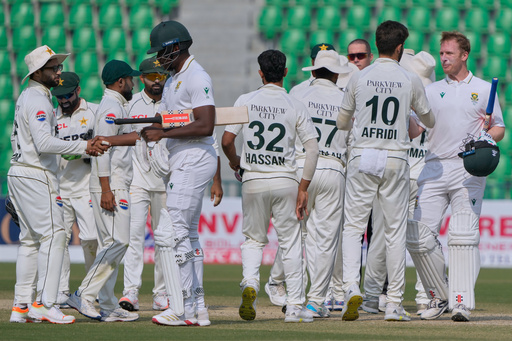 South Africa's Simon Harmer, right, and South Africa's Kagiso Rabada, fifth left, shakes hand with Pakistani players on the end of first test cricket match between Pakistan and South Africa, in Lahore, Pakistan, Wednesday, Oct. 15, 2025. (AP Photo/K.M. Chaudary) South Africa's Simon Harmer, right, and South Africa's Kagiso Rabada, fifth left, shakes hand with Pakistani players on the end of first test cricket match between Pakistan and South Africa, in Lahore, Pakistan, Wednesday, Oct. 15, 2025. (AP Photo/K.M. Chaudary)