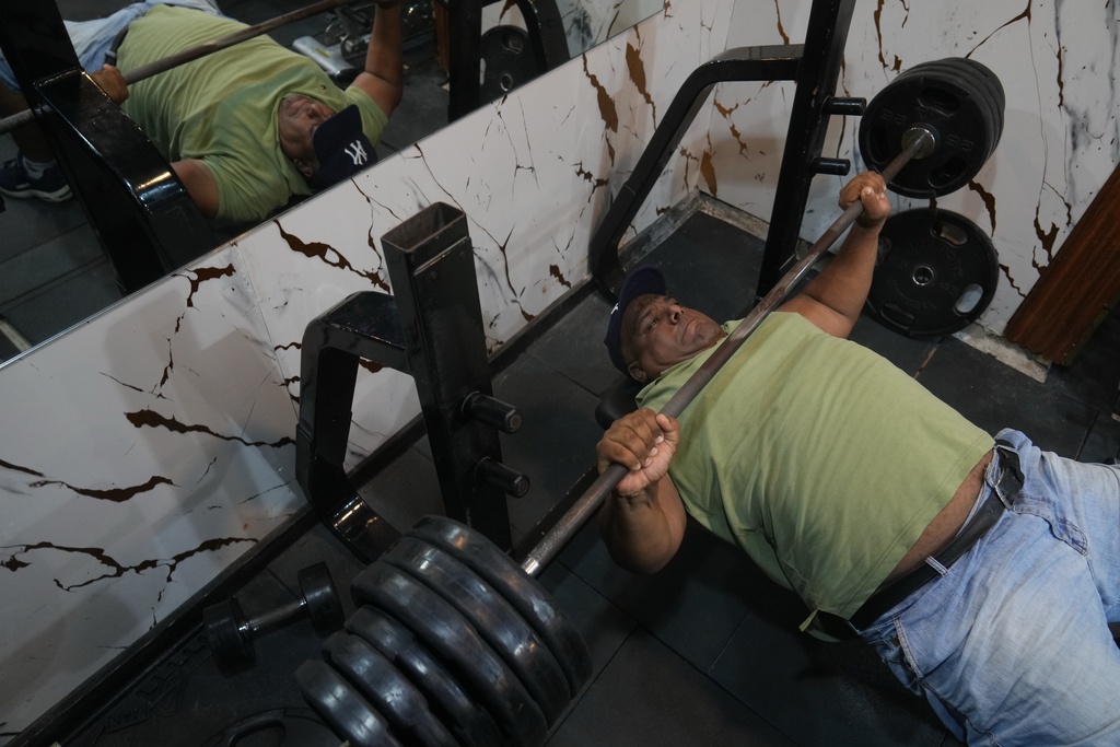 Egyptian wrestler Ashraf Mahrous, better known as Kabonga, trains at his gym in Cairo, Egypt, Thursday, July 15, 2025. (AP Photo/Amr Nabil)