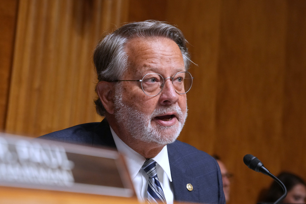 Sen. Gary Peters, D-Mich., speaks as Dr. Anthony Fauci appears before the Senate Homeland Security and Governmental Affairs Committee at the Capitol, Wednesday, July 29, 2026, in Washington. (AP Photo/Allison Robbert)