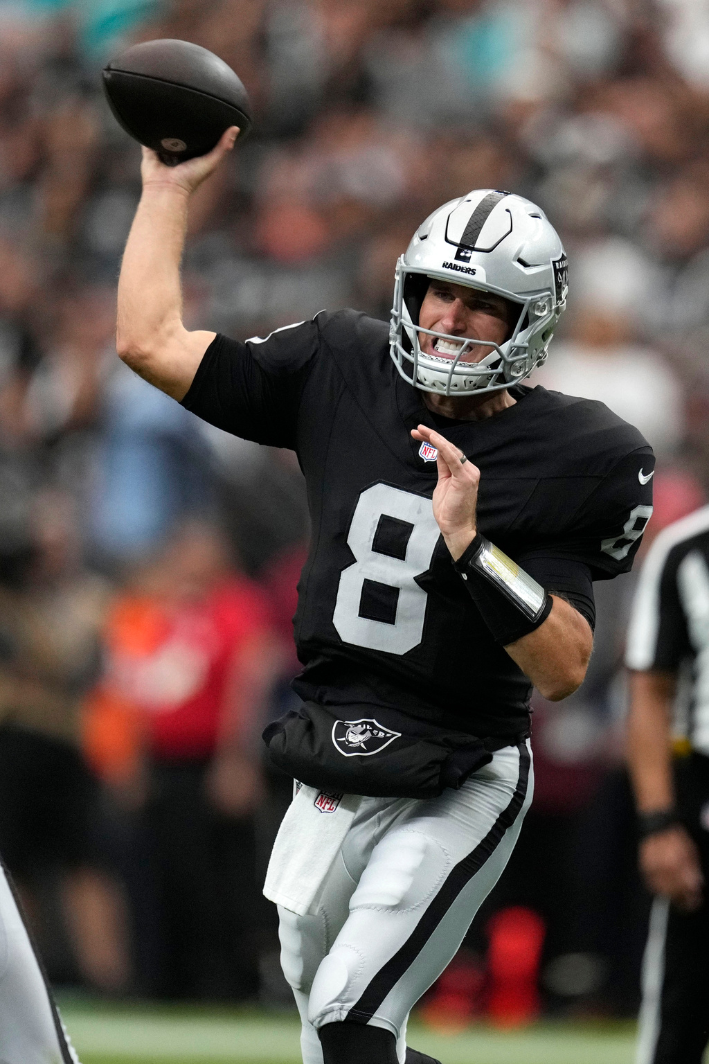 Las Vegas Raiders quarterback Kirk Cousins throws a pass during the first half of an NFL football game against the Miami Dolphins, Sunday, Sept. 13, 2026, in Las Vegas. (AP Photo/Ross D. Franklin)