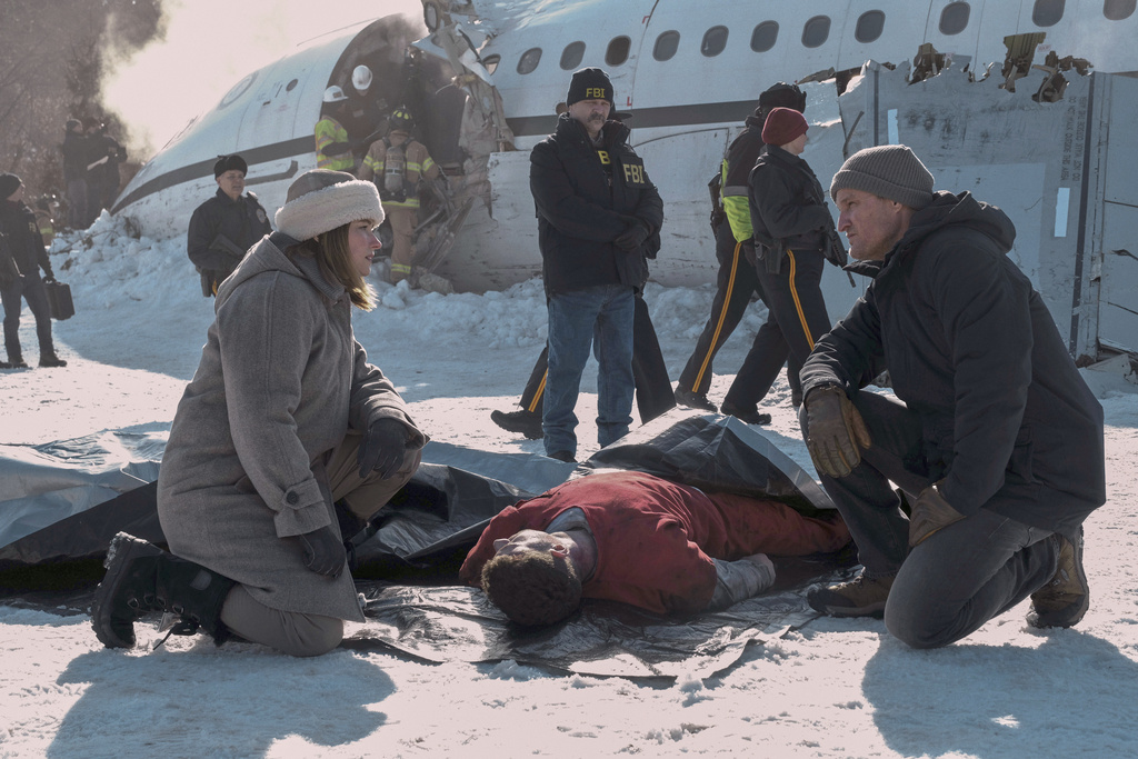 This image released by Apple TV+ shows Haley Bennett, left, and Jason Clarke in a scene from "The Last Frontier." (Apple TV+ via AP)