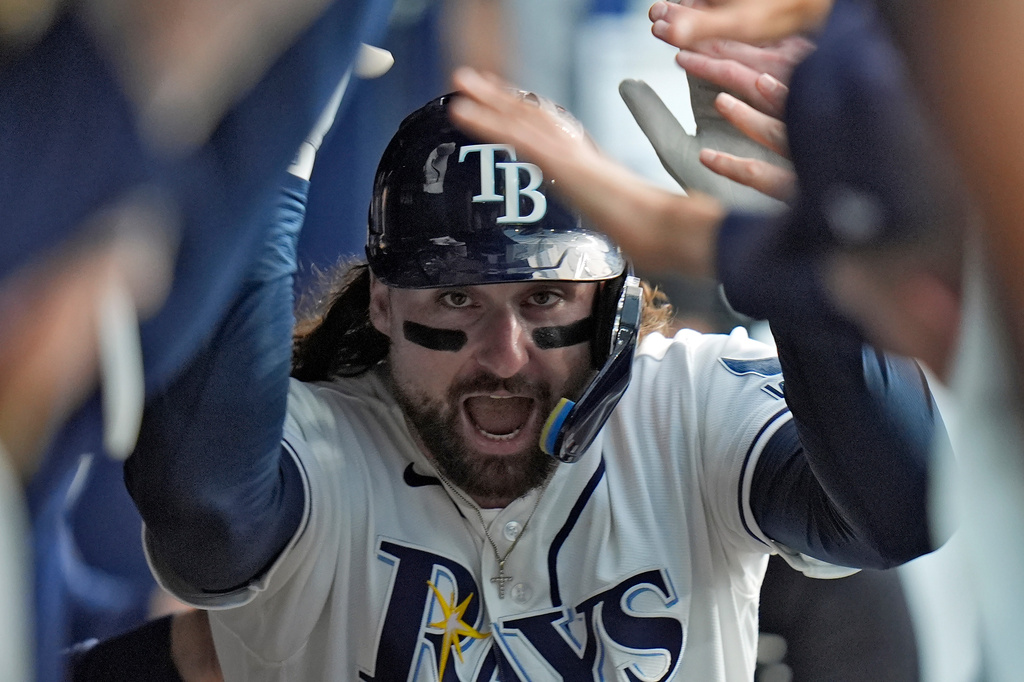 Tampa Bay Rays' Ryan Vilade celebrates in the dugout after his home run off Baltimore Orioles pitcher Brandon Young during the fourth inning of a baseball game Monday, Aug. 17, 2026, in St. Petersburg, Fla. (AP Photo/Chris O'Meara)