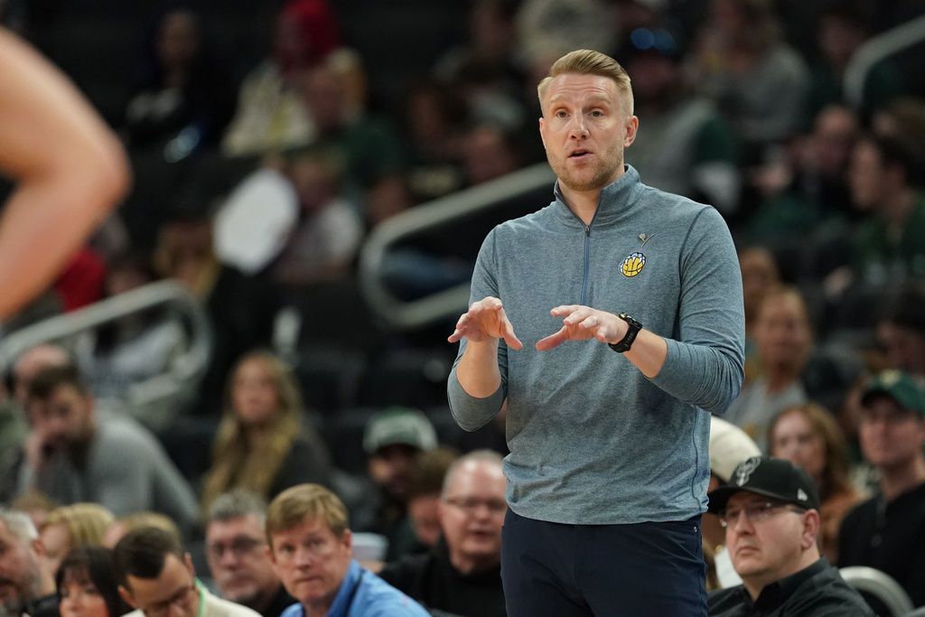 Memphis Grizzlies head coach Tuomas Iisalo gestures during the first half of an NBA basketball game against the Milwaukee Bucks, Sunday, April 5, 2026, in Milwaukee. (AP Photo/Aaron Gash)