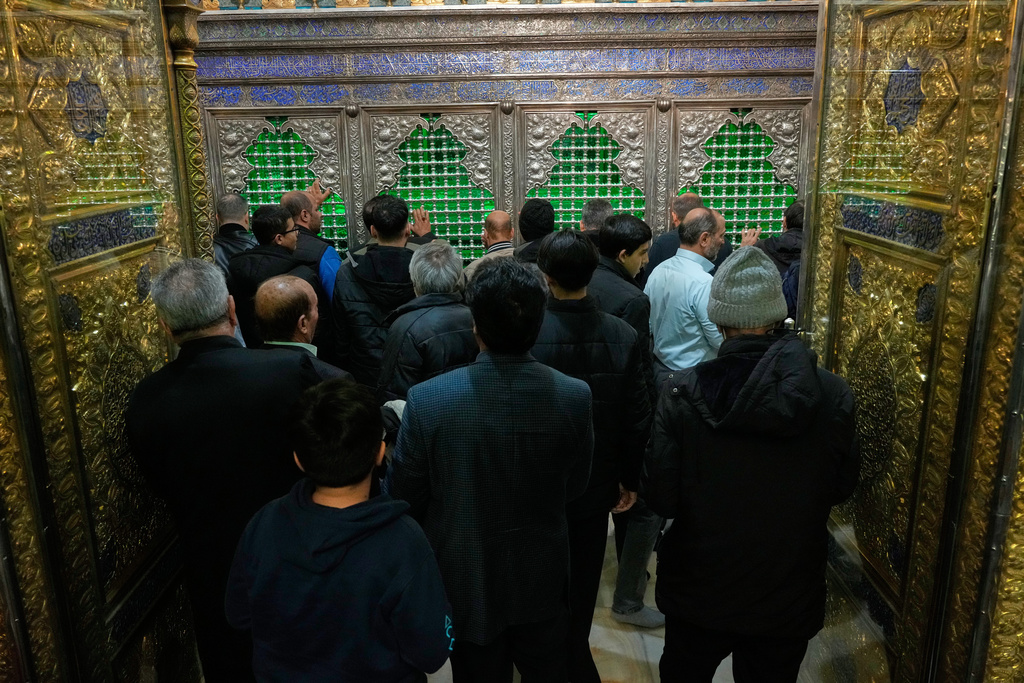 People pray at the Saint Abdulazim shrine in Shahr-e-Ray, south of Tehran, Iran, Thursday, Jan. 29, 2026. (AP Photo/Vahid Salemi)