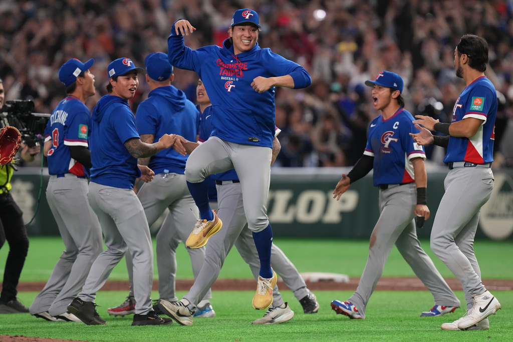 Taiwan players celebrate after defeating South Korea during a World Baseball Classic game between South Korea and Taiwan on Sunday, March 8, 2026 in Tokyo, Japan. (AP Photo/Eugene Hoshiko)