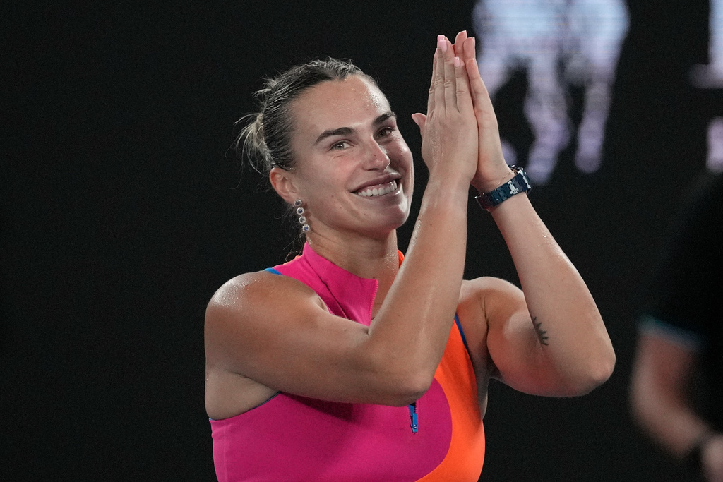 Aryna Sabalenka of Belarus celebrates after defeating Elina Svitolina of Ukraine in their semifinal match at the Australian Open tennis championship in Melbourne, Australia, Thursday, Jan. 29, 2026. (AP Photo/Dita Alangkara)