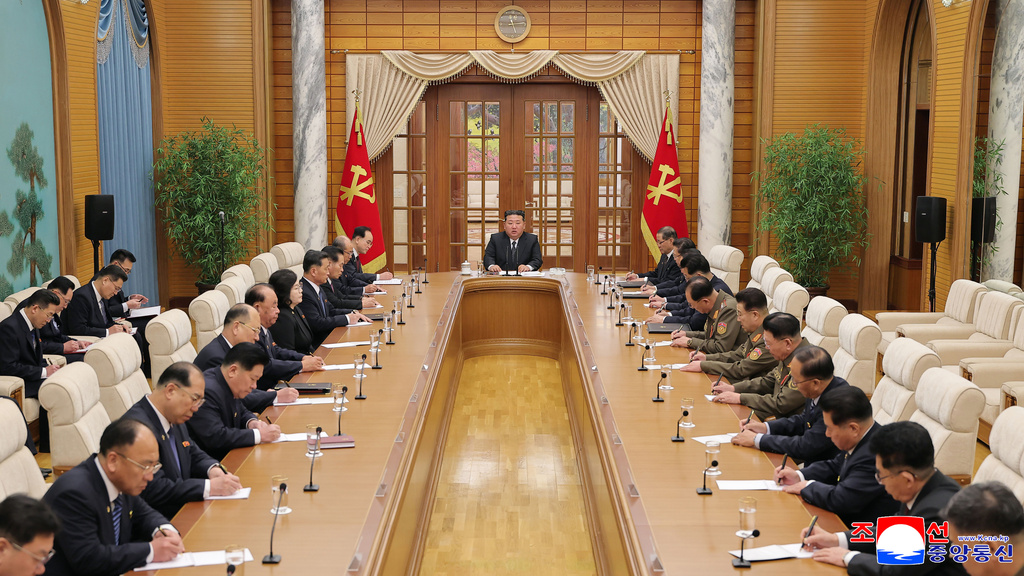In this photo provided by the North Korean government, North Korean leader Kim Jong Un, center, attends a meeting at the headquarters of the central committee of the ruling Workers' Party of Korea in Pyongyang, North Korea Saturday, Feb. 7, 2026. Independent journalists were not given access to cover the event depicted in this image distributed by the North Korean government. The content of this image is as provided and cannot be independently verified. Korean language watermark on image as provided by source reads: "KCNA" which is the abbreviation for Korean Central News Agency. (Korean Central News Agency/Korea News Service via AP)