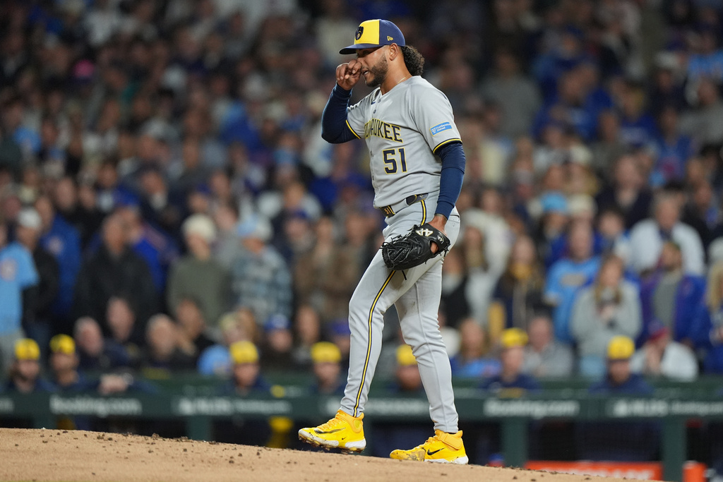 Milwaukee Brewers starting pitcher Freddy Peralta (51) walks on the mound during the second inning of Game 4 of baseball's National League Division Series against the Chicago Cubs Thursday, Oct. 9, 2025, in Chicago. (AP Photo/Nam Y. Huh)