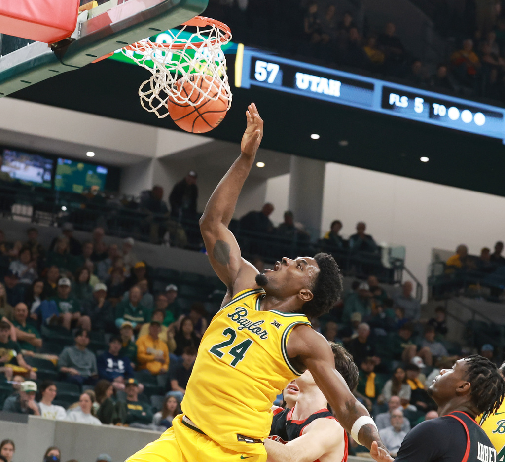 Baylor guard Tounde Yessoufou dunks over Utah in the second half of an NCAA college basketball game, Saturday, March 7, 2026, in Waco Texas. (Rod Aydelotte/Waco Tribune-Herald via AP)