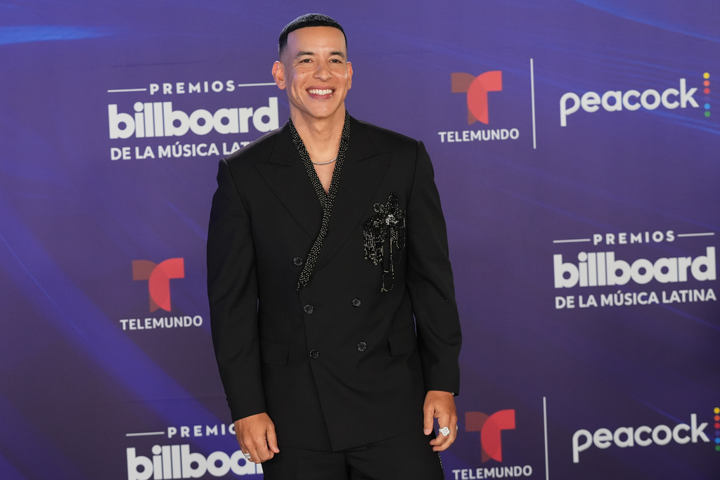 Daddy Yankee arrives at the Latin Billboard Awards Thursday, Oct. 23, 2025, in Miami. (AP Photo/Marta Lavandier)