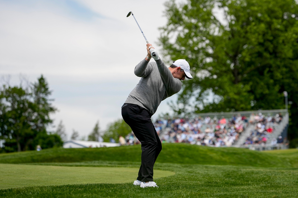 Rory McIlroy, of Northern Ireland, hits from the 13th fairway during a PGA Championship golf tournament practice round at Aronimink Golf Club, Wednesday, May 13, 2026, in Newtown Square, PA. (AP Photo/Carolyn Kaster)