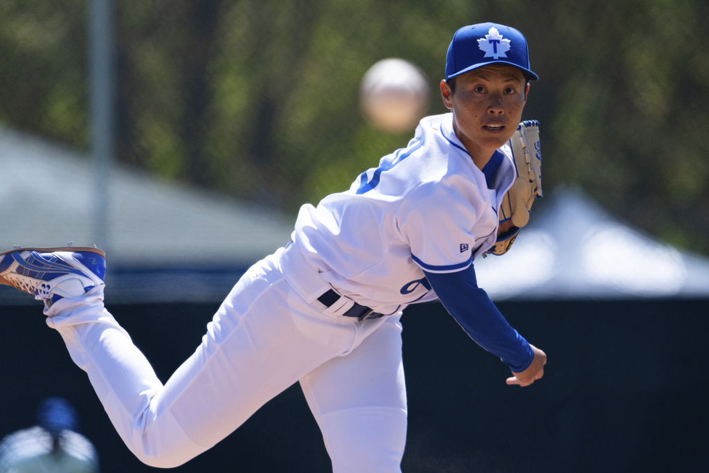 FILE - Toronto Maple Leafs pitcher Ayami Sato, of Japan, throws against the Kitchener Panthers during an Intercounty Baseball League game in Toronto, Sunday, May 11, 2025. (Arlyn McAdorey/The Canadian Press via AP, File)