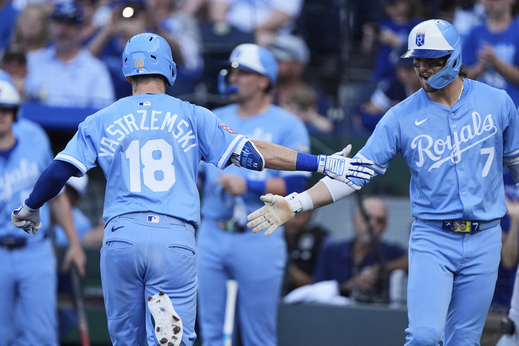 Kansas City Royals' Mike Yastrzemski (18) celebrates with Bobby Witt Jr. (7) after hitting a solo home run during the first inning of a baseball game against the Chicago White Sox, Saturday, Aug. 16, 2025, in Kansas City, Mo. (AP Photo/Charlie Riedel)