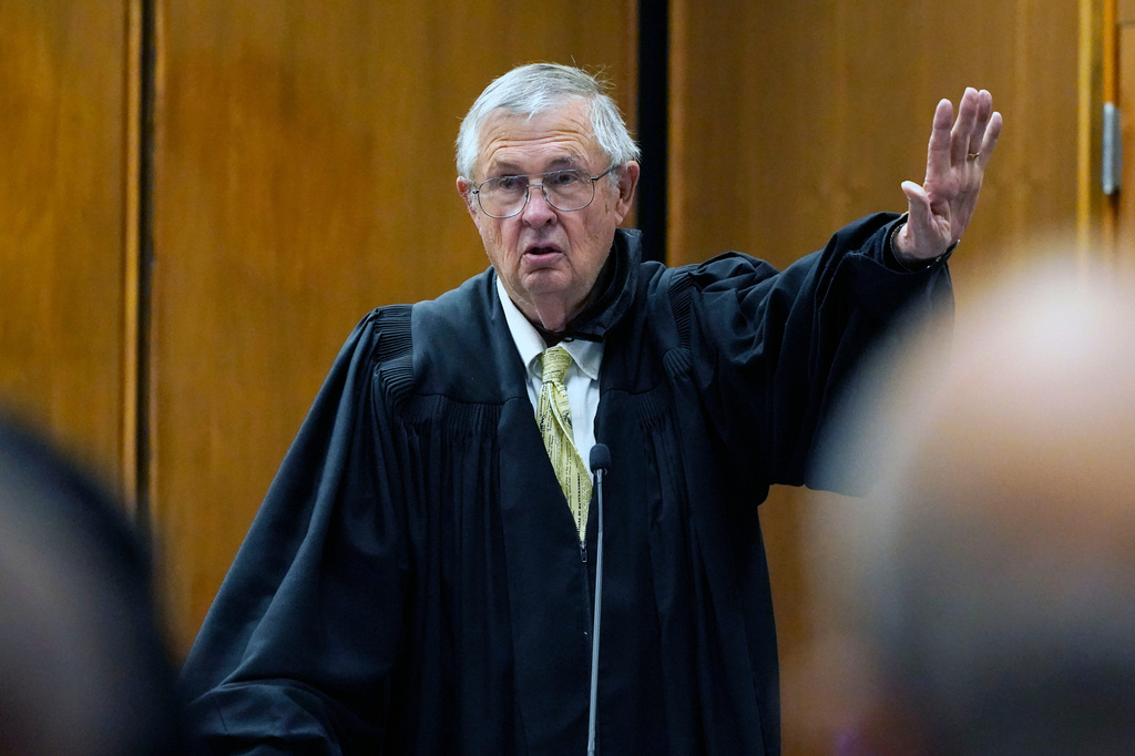 FILE - Senior Judge Glen H. Davidson speaks to the audience during the "gavel passing ceremony" for the new U.S. District Chief Judge Debra M. Brown, in Greenville, Miss., June 11, 2021. (AP Photo/Rogelio V. Solis, File)