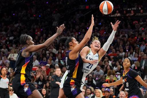 Phoenix Mercury forward Satou Sabally, center, fouls Minnesota Lynx guard Kayla McBride (21) during the first half of Game 4 of a WNBA basketball playoff semifinals series, Sunday, Sept. 28, 2025, in Phoenix. (AP Photo/Samantha Chow) Phoenix Mercury forward Satou Sabally, center, fouls Minnesota Lynx guard Kayla McBride (21) during the first half of Game 4 of a WNBA basketball playoff semifinals series, Sunday, Sept. 28, 2025, in Phoenix. (AP Photo/Samantha Chow)