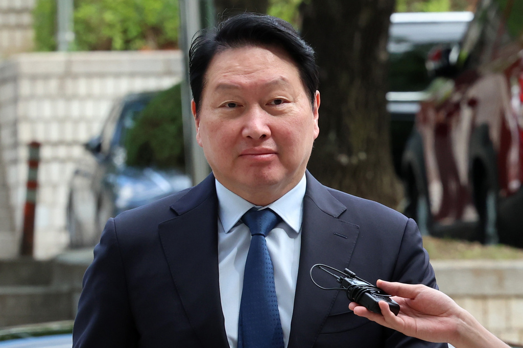 SK Group Chairman Chey Tae-won arrives at the Seoul High Court in Seoul, South Korea, Friday, June 26, 2026. (Lee Young-hwan/Newsis via AP)
