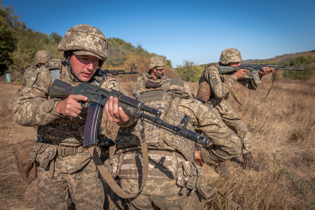 Ukrainian soldiers of the 66th Brigade take part in a training combat exercise in Donetsk region, Ukraine, Thursday, Sept. 25, 2025. (AP Photo/Dan Bashakov)
