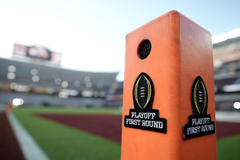 The College Football Playoff logo is seen at Kyle Field before the start of a first round of the College Football Playoff game between Miami and Texas A&M on Saturday, Dec. 20, 2025, in College Station, Texas. (AP Photo/Sam Craft)