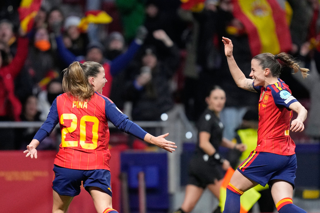 Spain's Claudia Pina (20) celebrates after scoring her side's opening goal during the Women's Nations League final soccer match between Spain and Germany in Madrid, Spain, Tuesday, Dec. 2, 2025. (AP Photo/Bernat Armangue)