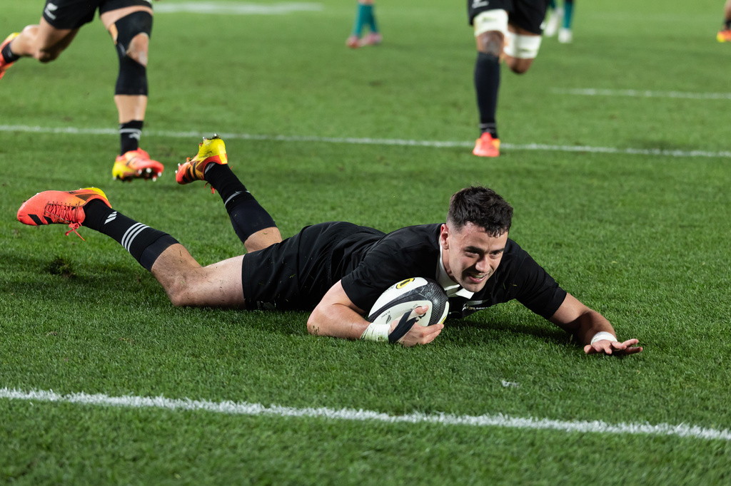 New Zealand's Will Jordan scores a try against Ireland during their Nations Championship rugby international test match in Auckland, New Zealand, Saturday, July 18, 2026. (Brett Phibbs/Photosport via AP)