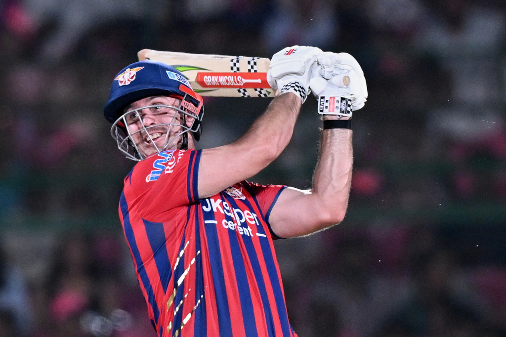 Lucknow Super Giants' Mitchell Marsh plays a shot during the Indian Premier League cricket match between Lucknow Super Giants and Rajasthan Royals in Jaipur, India, Tuesday, May 19, 2026. (AP Photo)
