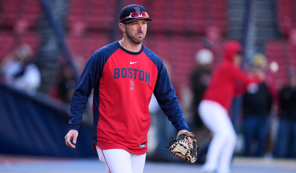 Boston Red Sox manager Chad Tracy walks on the field during batting practice prior to a baseball game against the Cleveland Guardians, Tuesday, Sept. 22, 2026, in Boston. (AP Photo/Charles Krupa)