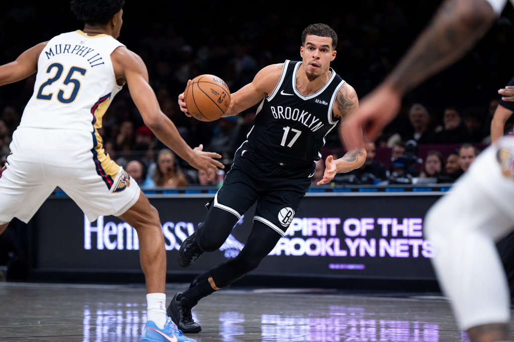 Brooklyn Nets forward Michael Porter Jr. (17) brings the ball toward the basket during the first half of an NBA basketball game against the New Orleans Pelicans, Saturday, Dec. 6, 2025, in New York. (AP Photo/Angelina Katsanis)
