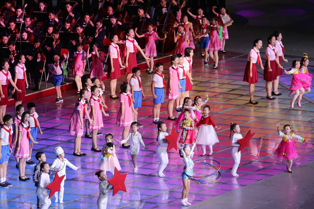 Children perform during the ceremony marking the 80th anniversary of the founding of the ruling Workers' Party at the May Day Stadium in Pyongyang, North Korea, Thursday, Oct. 9, 2025. (AP Photo/Jon Chol Jin)