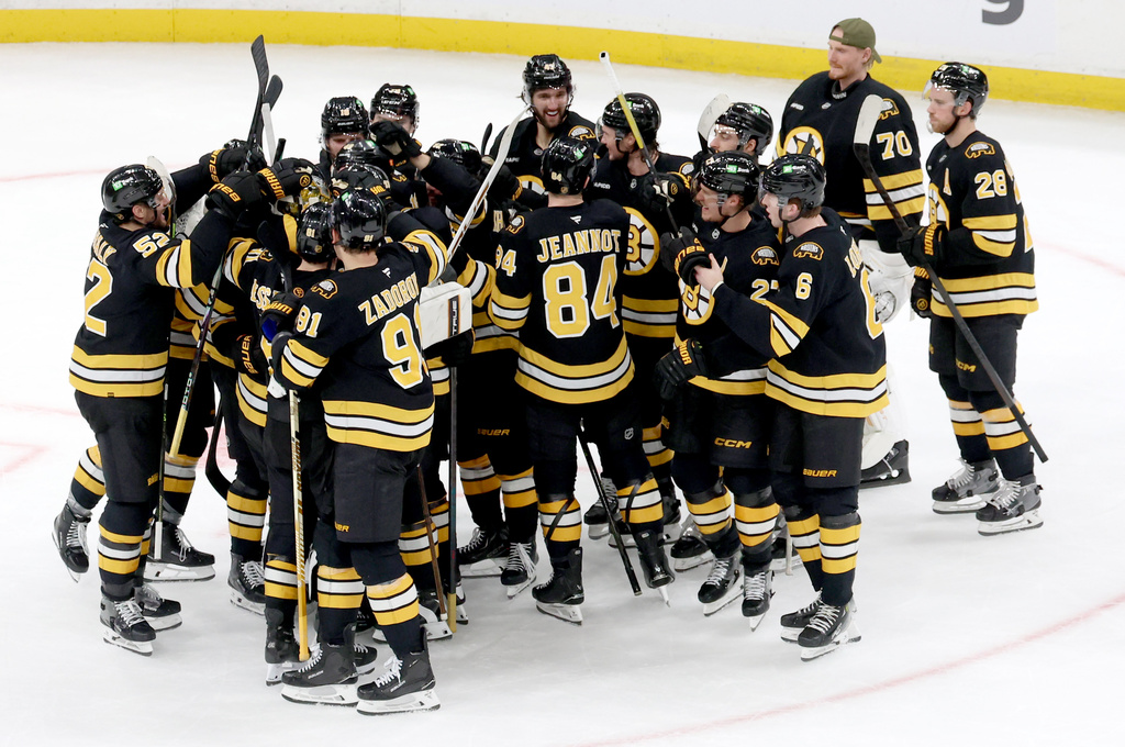 The Boston Bruins celebrate their win after a shootout with the Detroit Red Wings in an an NHL hockey game, Saturday, Nov. 29, 2025, in Boston. (AP Photo/Mark Stockwell)