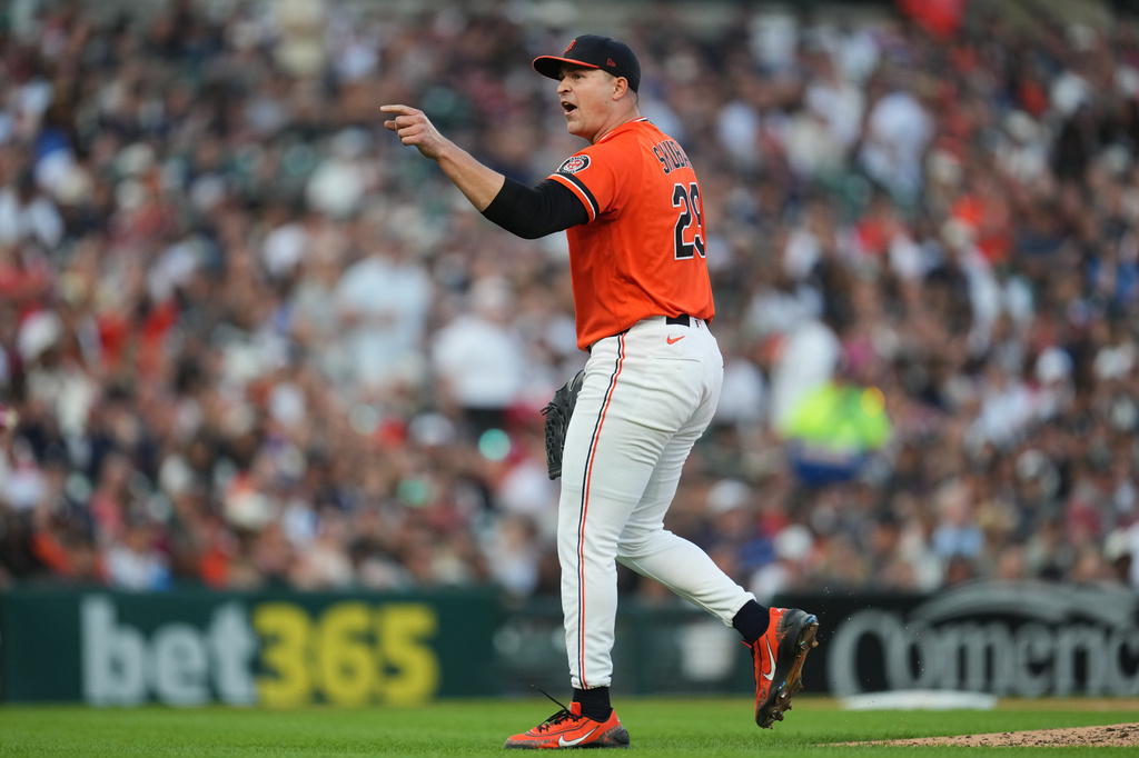 Detroit Tigers pitcher Tarik Skubal (29) reacts towards the Chicago White Sox dugout during the fifth inning of a baseball game Friday, June 19, 2026, in Detroit. (AP Photo/Paul Sancya)