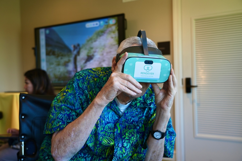 Bob Rogallo watches video through a Rendever virtual-reality headset at the Forum at Rancho San Antonio retirement community in Cupertino, Calif. on June 11, 2025. (AP Photo/Terry Chea)