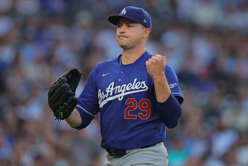 Los Angeles Dodgers' Tarik Skubal celebrates as he walks back to the dugout during the first inning of a baseball game against the Chicago Cubs, Tuesday, Aug. 4, 2026, in Chicago. (AP Photo/Melissa Tamez)