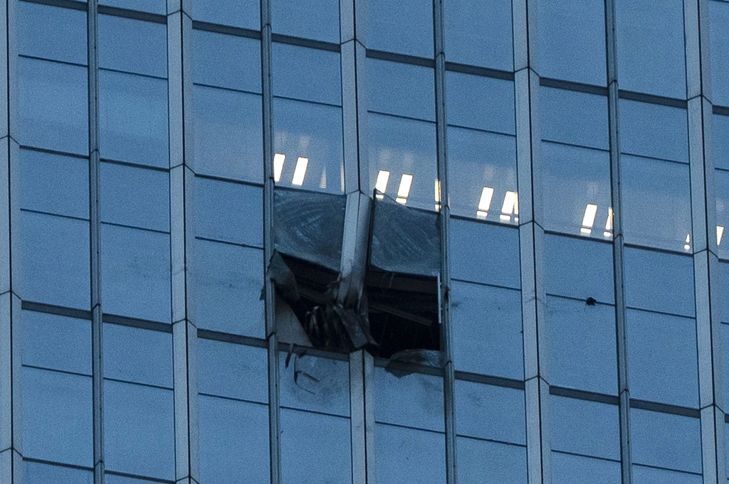 The surface of the Citic Tower also known as Zun Tower is damaged in Beijing,, Friday, June 26, 2026. (AP Photo/Han Guan Ng)