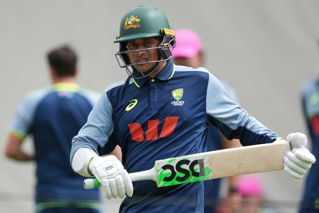 Australia Usman Khawaja warms up during a practice session ahead of the fifth and final Ashes cricket test between England and Australia in Sydney, Australia, Friday, Jan. 2, 2026. (AP Photo/Mark Baker)